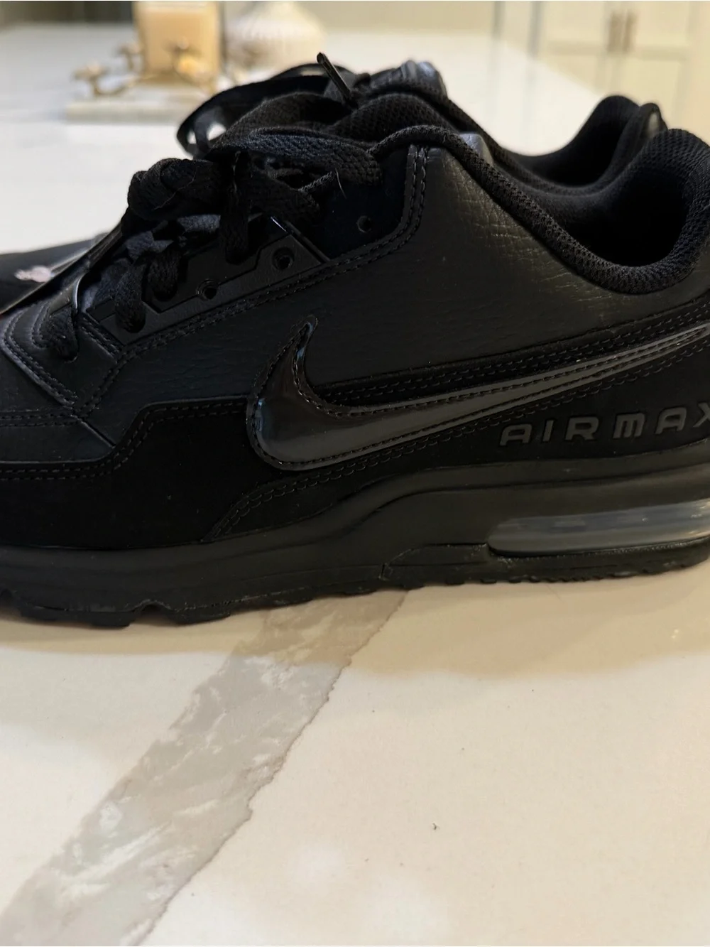 Nike Men’s Black Low-Top Leather Sneakers
